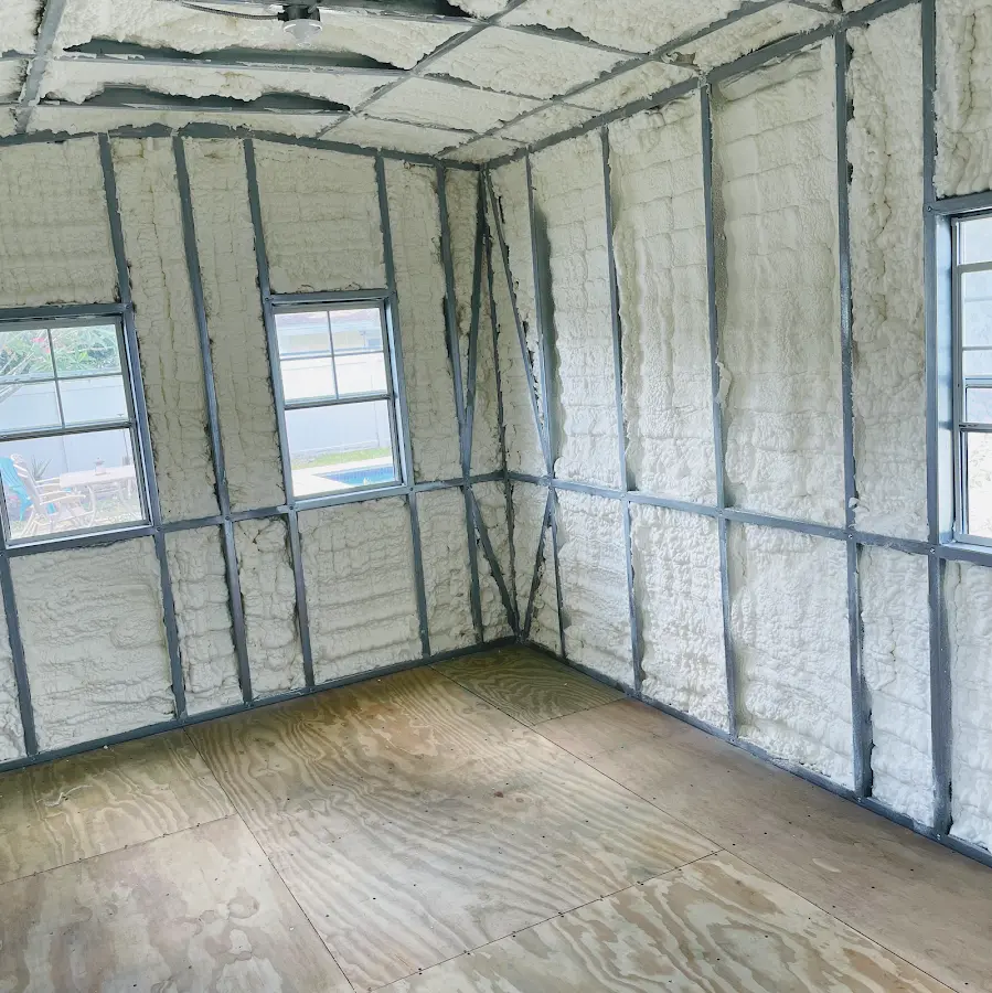 Closed-cell spray foam insulation applied to wall cavities in a residential project in Makaha